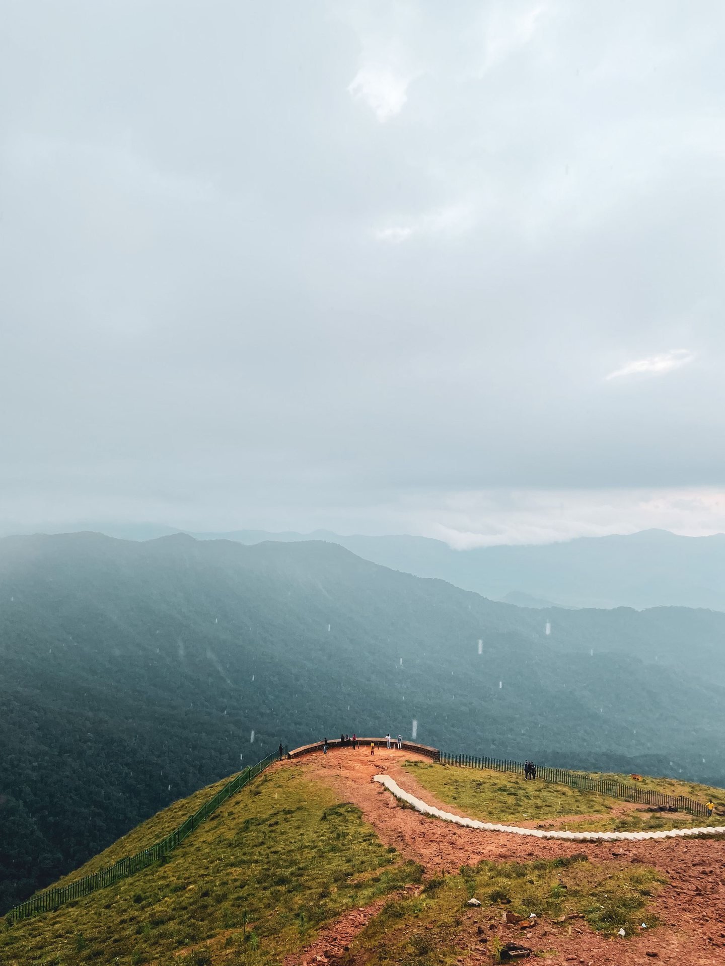 A rainy viewpoint above the Madikeri hills